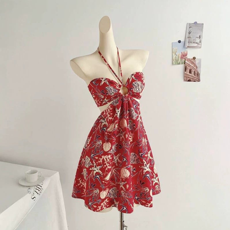 Bohemian Beach Halter Neck Dress with Floral Print and Cutout Waist - Image 1