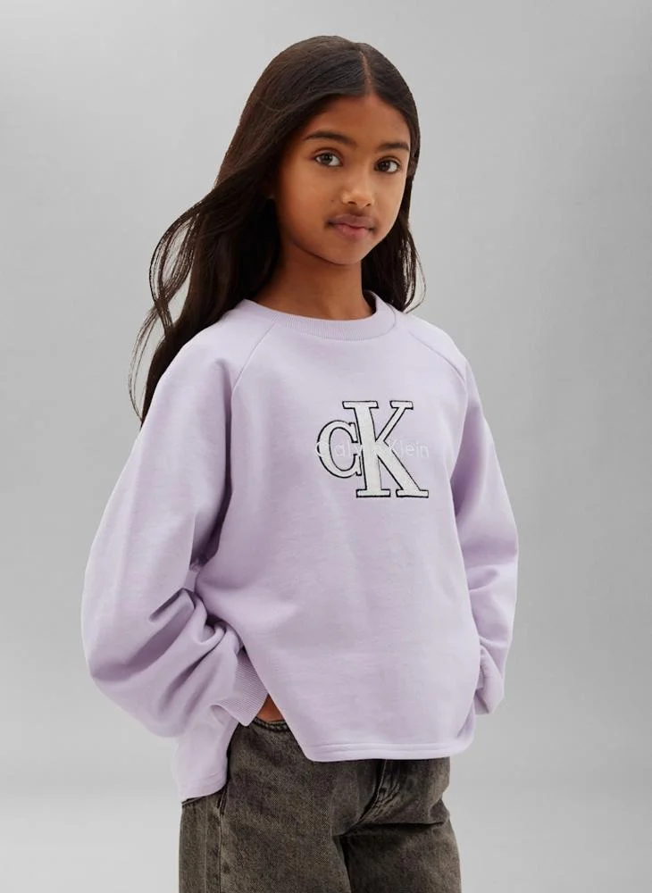 Calvin Klein Jeans Orchid Petal Monologo Appliqué Dipped Hem Sweatshirt for Women | Best Price UAE
