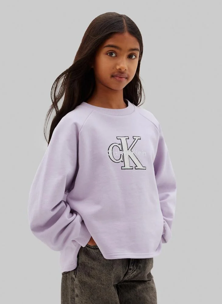Calvin Klein Jeans Orchid Petal Monologo Appliqué Dipped Hem Sweatshirt for Women | Best Price UAE