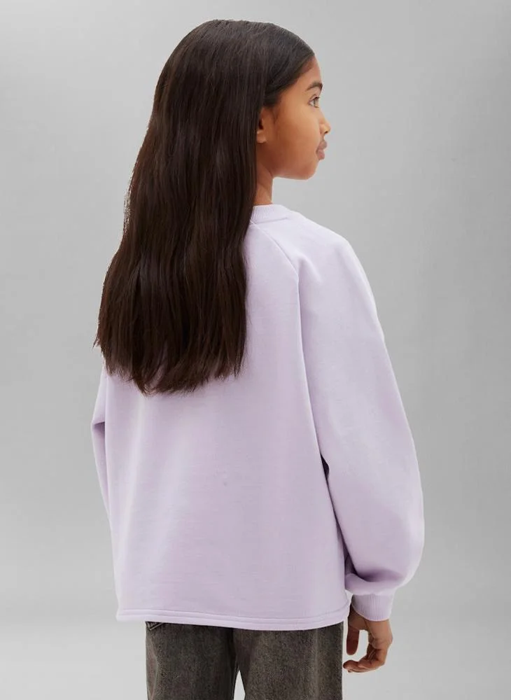Calvin Klein Jeans Monologo Appliqué Dipped Hem Sweatshirt