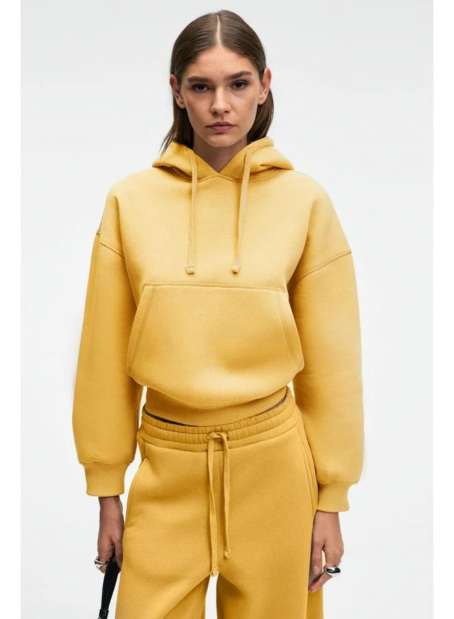 GRIMELANGE SELENE Women's Hooded Kangaroo Pocket Regular Fit Yellow Sweatshirt.
