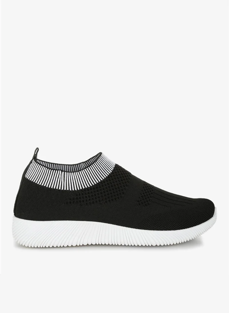 Flyknit Walking Sneakers in Black