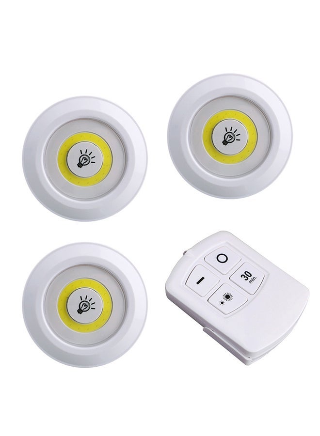 مجموعة إضاءة LED لأسفل الخزانة لاسلكية وبجهاز تحكم عن بعد ومكونة من 3 قطع أبيض 10x10x9سم - Image 1