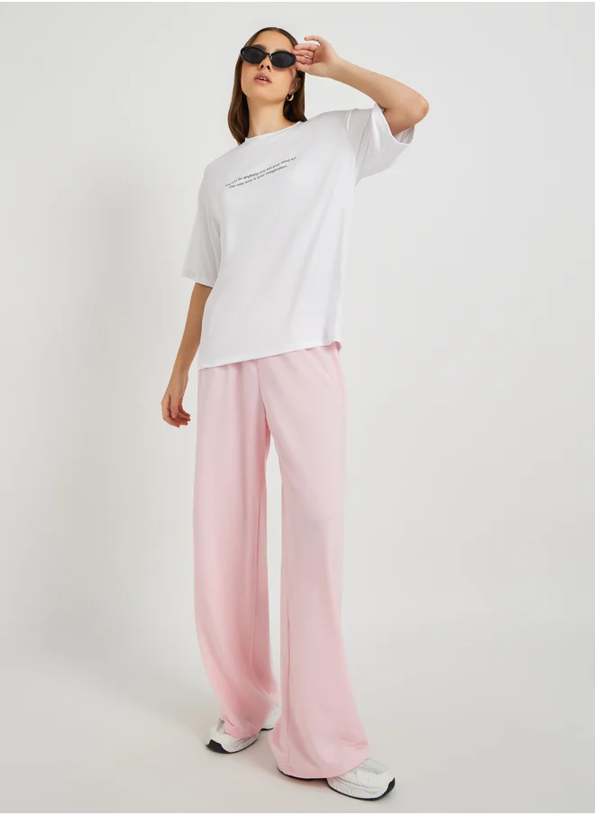 Styli Slogan Print Round Neck Oversized T-Shirt