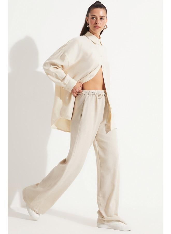 جون بنطلون جينز قطن بمقاس مرن بلون حجري - Image 1