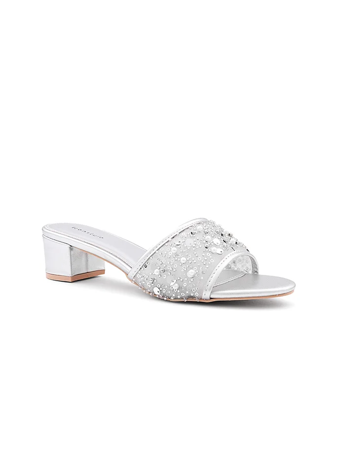 أيقون Modern open-toe heel slipper with a sleek silhouette.