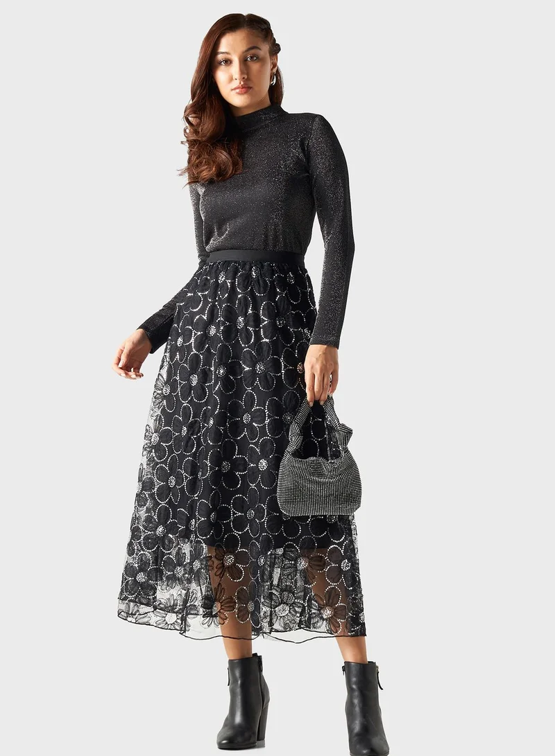 تواكستريمز تنورة ميدي سوداء مزهرة