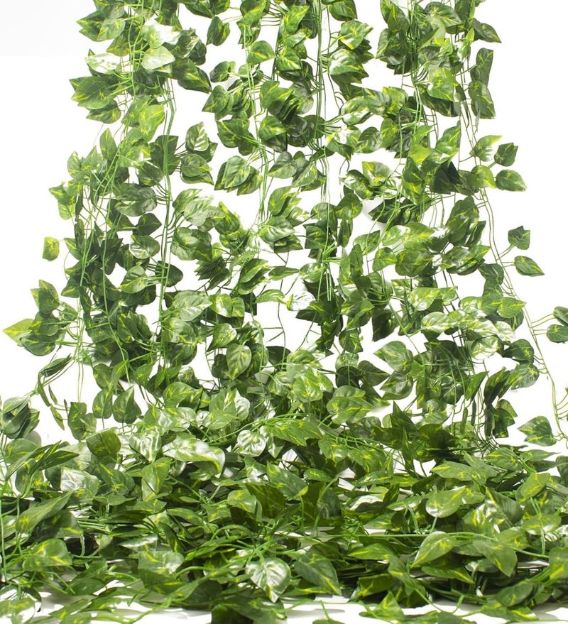 مكمولا نباتات اللبلاب الاصطناعية من ماكمولا، 12 خيطًا بطول 78.7 قدمًا (24 مترًا) من الأكاليل الاصطناعية وأوراق الشجر المزيفة والزهور المعلقة لتزيين الجدران في المنزل والمطبخ والحديقة والمكتب وحفلات الزفاف والحفلات، باللون الأخضر. - Image 1