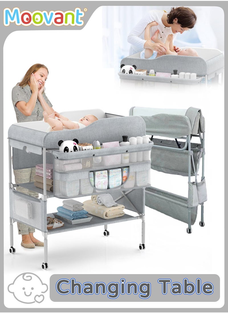 Moovant - Portable Baby Changing Table, Foldable Infant Diaper Station with Wheels, Nursery Organizer, Waterproof Diaper Changing Table, Pad Topper Diaper Organizer with Storage Rack, Strengthen Structure and Adjustable Heights - Image 1