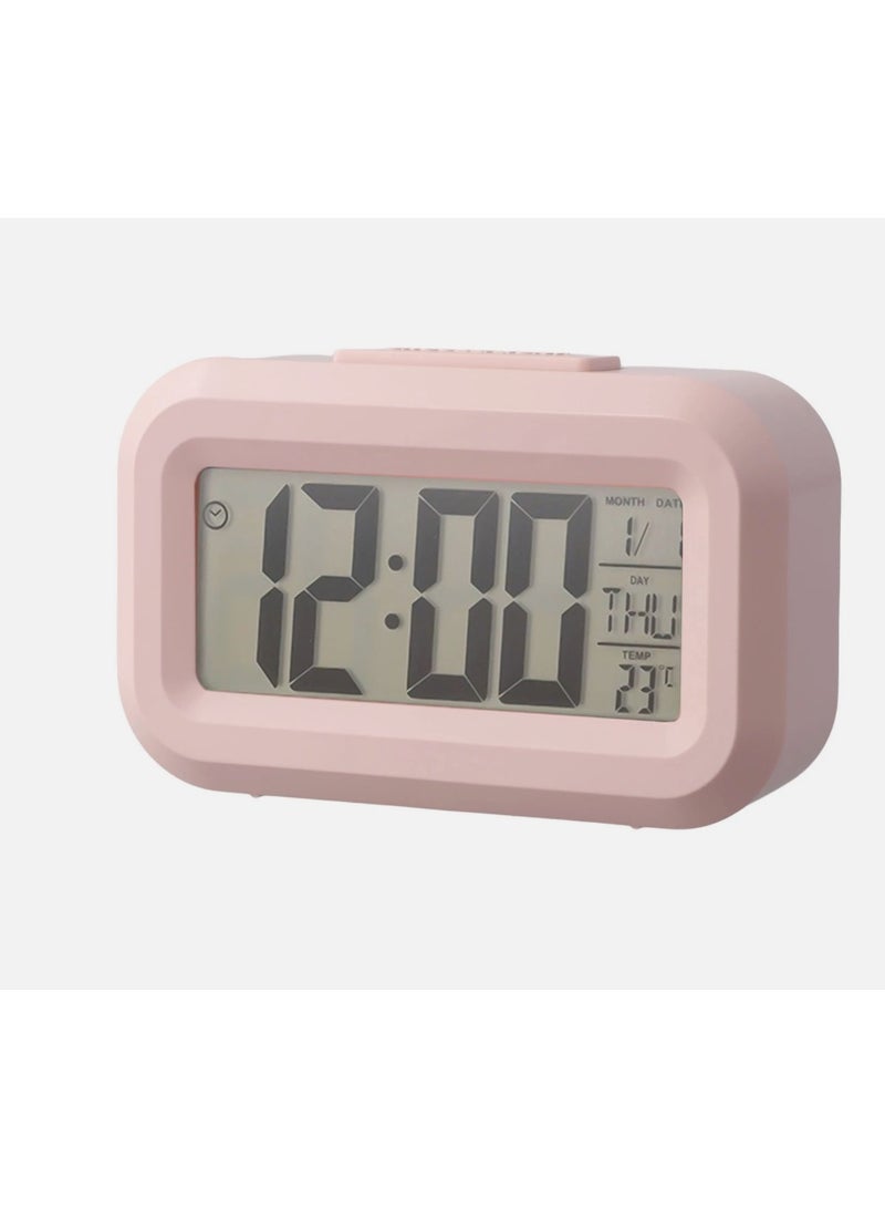 ساعة رقمية للطاولة بشاشة LCD، مع عرض درجة الحرارة والتاريخ، منبه إلكتروني مثالية للاستخدام في المكتب أو غرفة النوم. مجهزة بوظيفة المنبه لمساعدتك على الاستيقاظ في الوقت المحدد، متعدده الالوان. (بينك) - Image 1