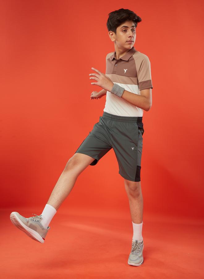 تكنوسبورت شورت رياضي ولادي بقصة ضيقة وألوان متداخلة من تكنوسبورت - Image 1