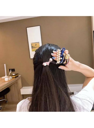 A set of flexible and stylish hair ties – 12 pieces with a cute design that provide comfortable hold and complete your look with softness! - pzsku/ZD7F8A65A068A7475DE01Z/45/1741556067/598b4ae4-d612-4a00-924d-b66cbc4bbf71