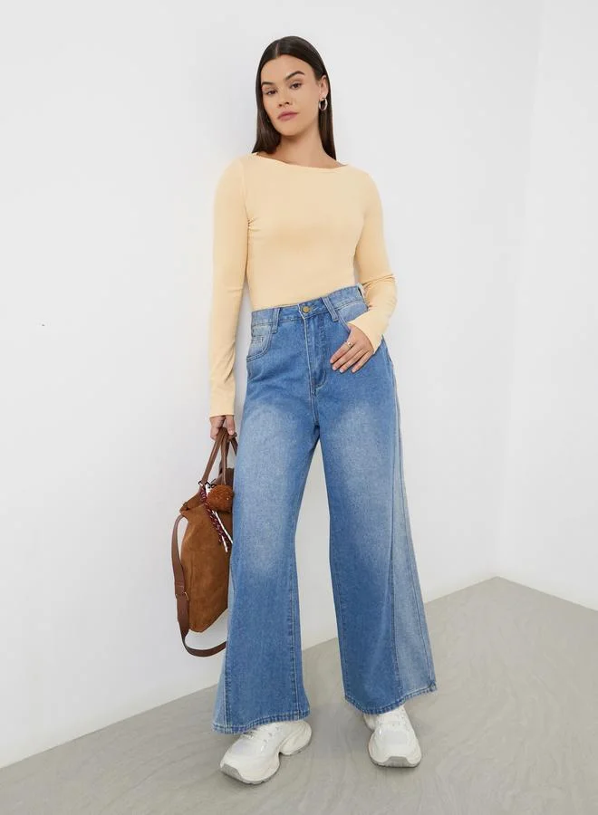Styli High Rise Wide Leg Faded Jeans