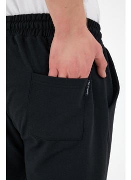 Black Men's Sweatpants with Label Back and Side Pockets Regular Fit - pzsku/ZD803D66A16AA1E52C4AEZ/45/_/1728060711/95e848a4-450b-481f-b4d7-afe3dd061ab4