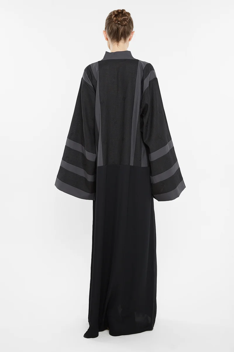 NUKHBAA A casual abaya with grey striped embroidery detailing.-AJ116A