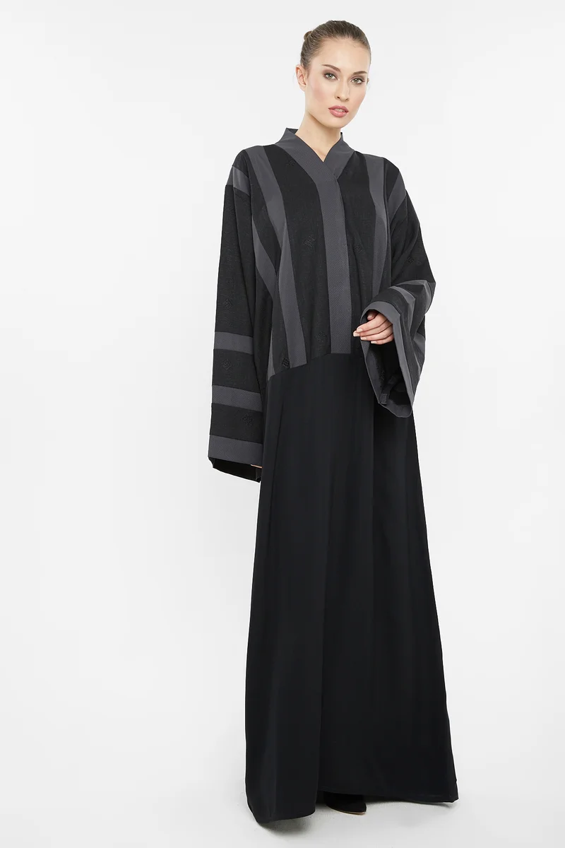 NUKHBAA A casual abaya with grey striped embroidery detailing.-AJ116A