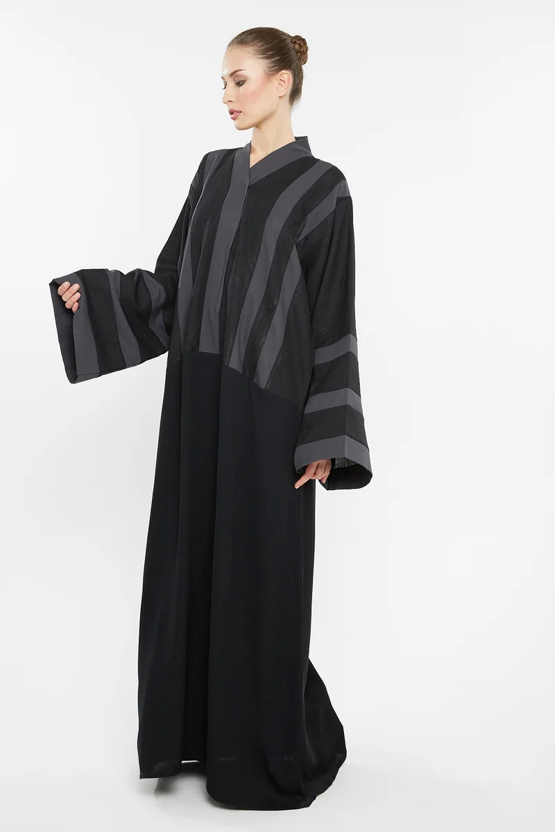 NUKHBAA A casual abaya with grey striped embroidery detailing.-AJ116A