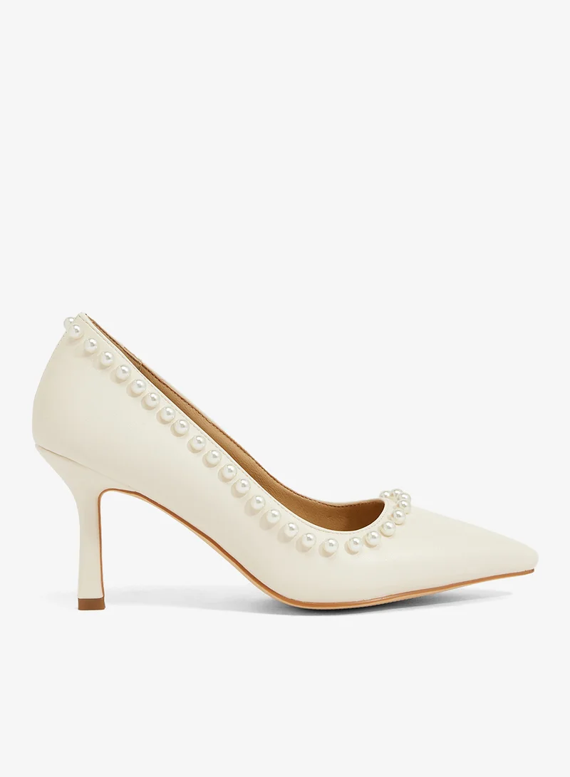 Ivory pump with pearl trim, mid heel, pointed toe