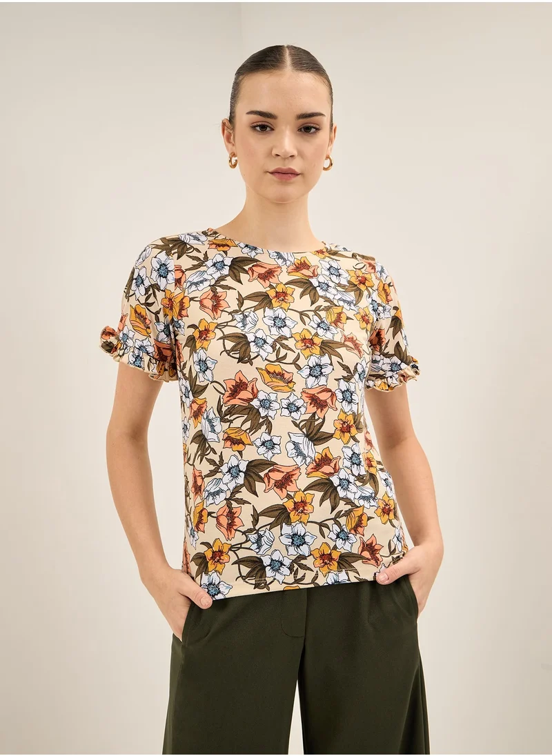 سولت اتاير Women's Multi-Color Floral Pattern Top with Round Neckline, Half-Length Sleeves, Ruffled Sleeve Hem, and Regular Fit for a Chic and Feminine Look