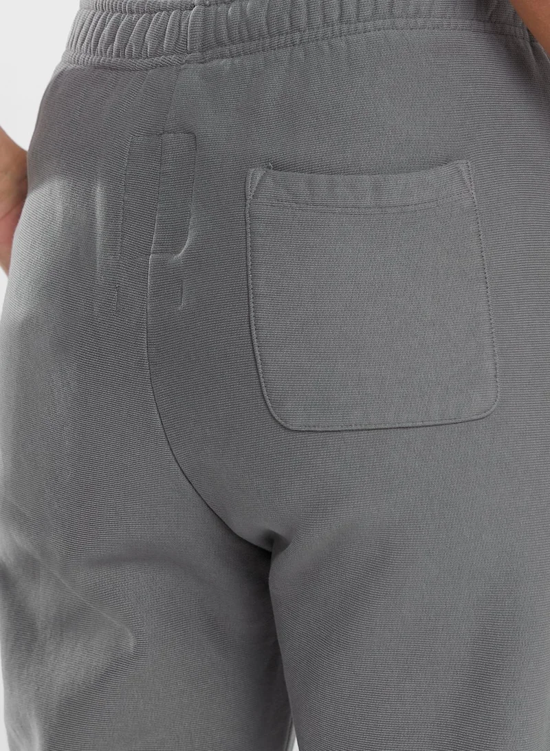 Champion Logo Cuffed Sweatpants