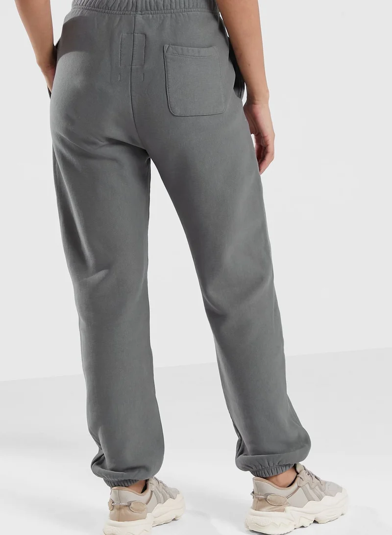 Champion Logo Cuffed Sweatpants