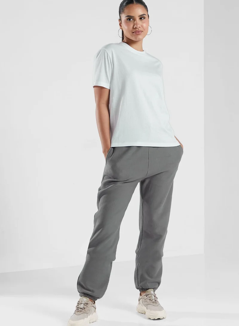 Champion Logo Cuffed Sweatpants