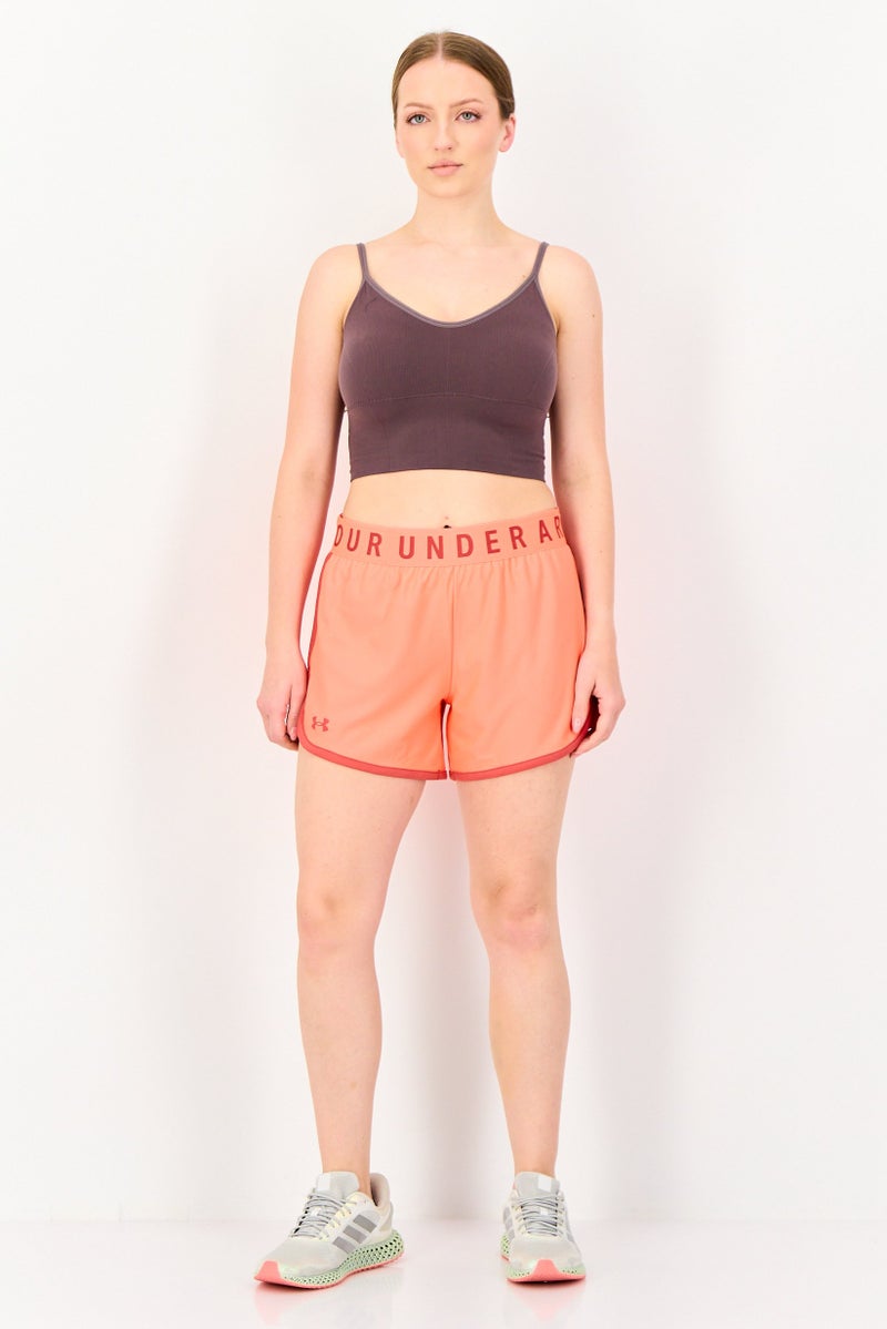 UNDER ARMOUR شورت تدريب فضفاض للنساء بطول 5 إنش، برتقالي - Image 4