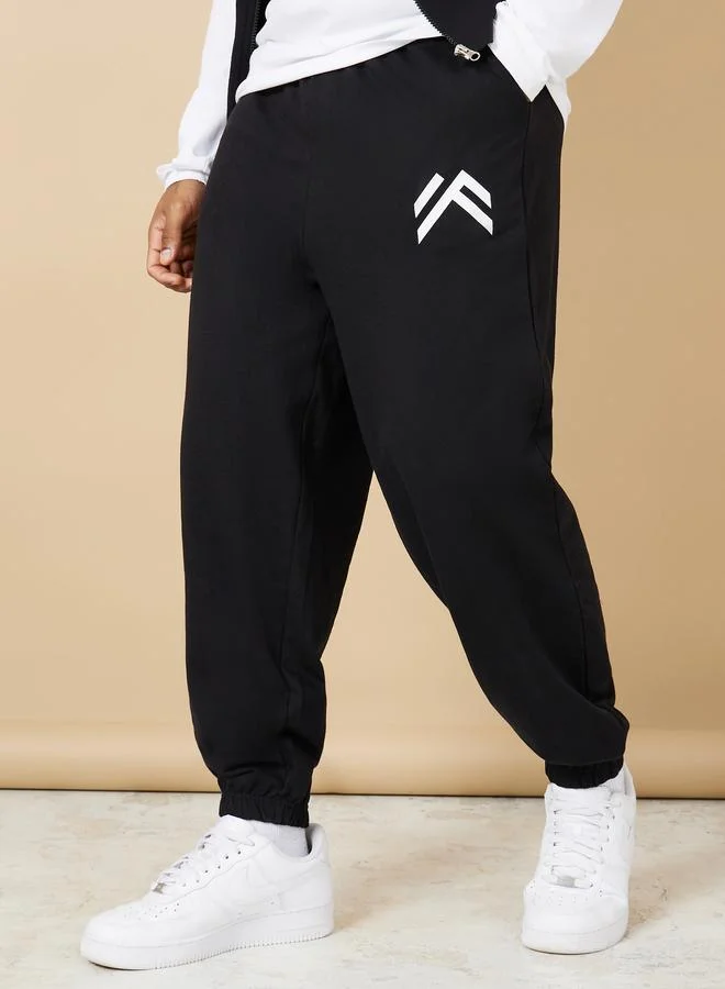 Styli Styli Minimal Print Oversized Joggers with Elasticated Hem