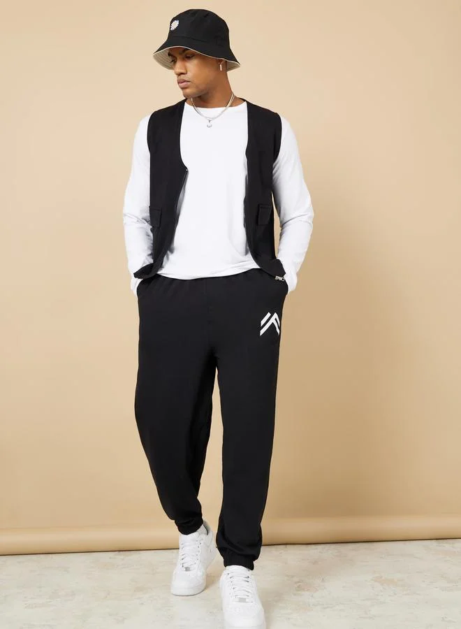 Styli Styli Minimal Print Oversized Joggers with Elasticated Hem