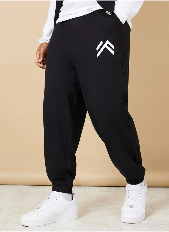 Styli Oversized Fit Jogger With Minimal Print & Elasticated Hem