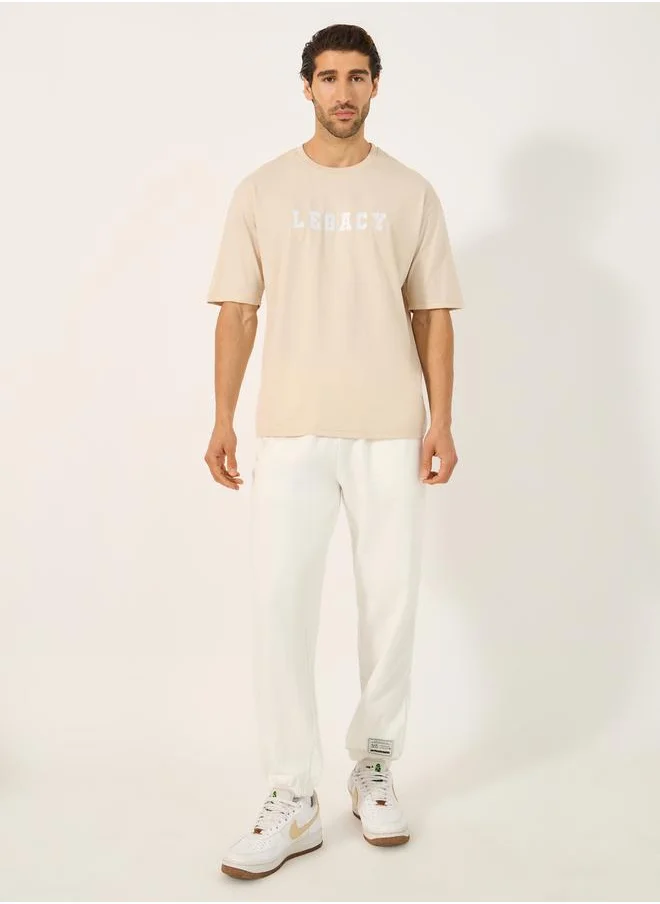 Styli Varsity Font Embroidered Round Neck Oversized T-Shirt