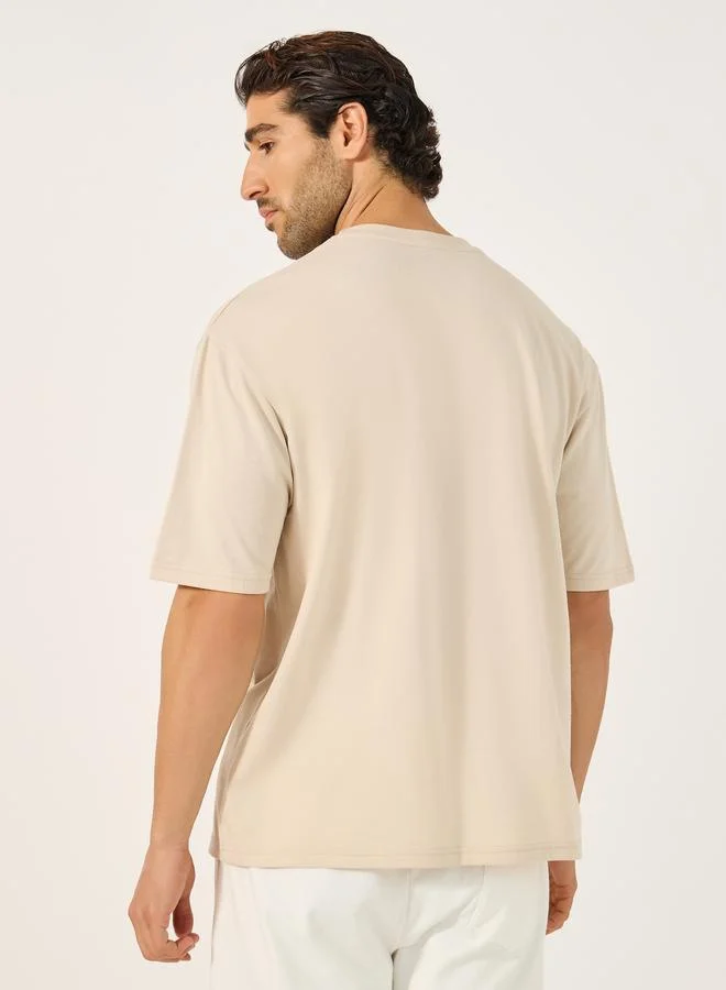 Styli Styli Varsity Font Embroidered Round Neck Oversized T-Shirt