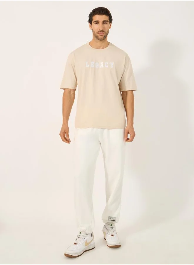 ستايلي Styli Varsity Font Embroidered Round Neck Oversized T-Shirt