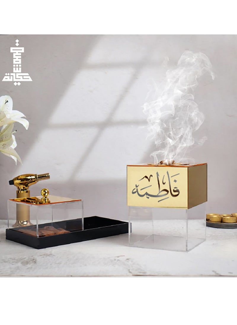 حكاية شمعة مبخرة ذهبي بإسم فاطمه مبخرة مصنوعه من الاكريلك الشفاف والذهبي 