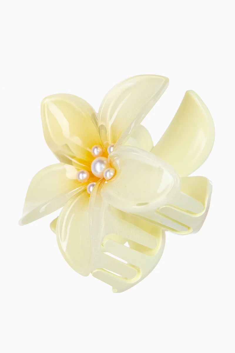 اتش اند ام مشابك شعر بشكل زهرة