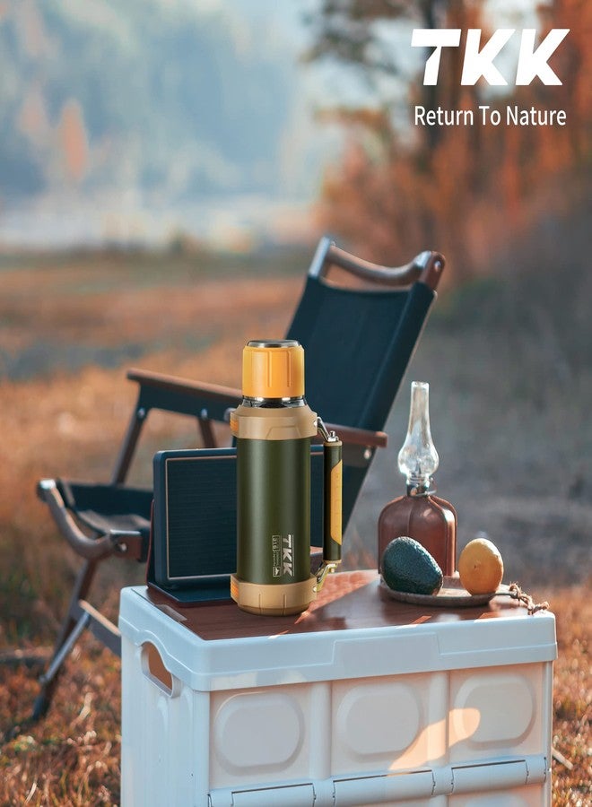 تي ك ك زجاجة معزولة كبيرة من الفولاذ المقاوم للصدأ بسعة 2 كوارت (64 أونصة) مع مقبض للكوب، تحافظ على المشروبات ساخنة أو باردة لمدة تصل إلى 24 ساعة، مثالية للتجمعات الخارجية والتخييم. - Image 2