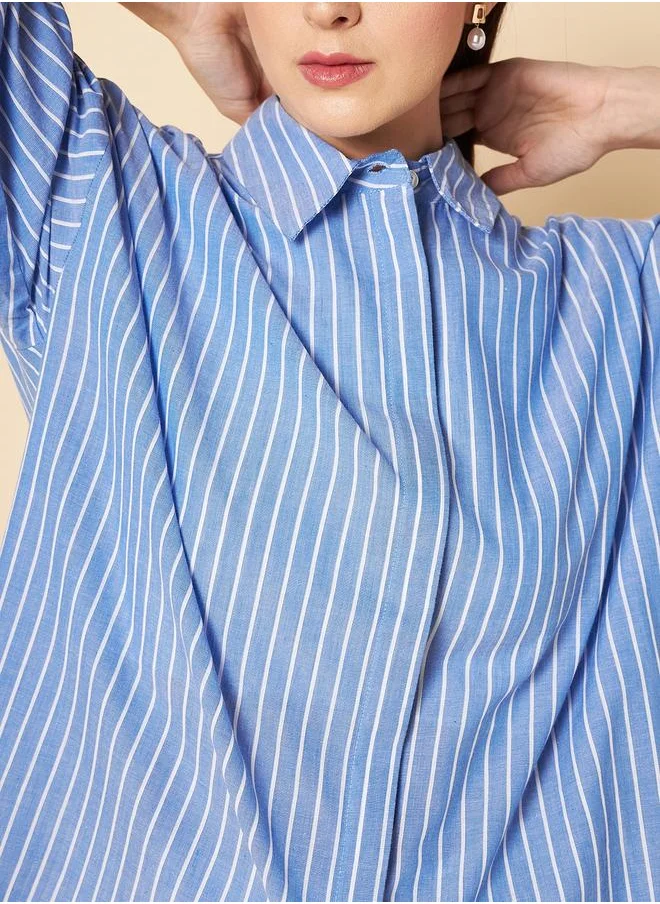 هاي ستار Stay effortlessly stylish with this comfortable Blue Oversized Shirts Solid design crafted from 100% Cotton featuring Long Sleeves with Button closure.