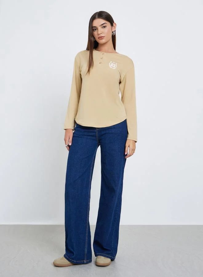 Styli Women Beige Graphic Print Henley Neck T-Shirt