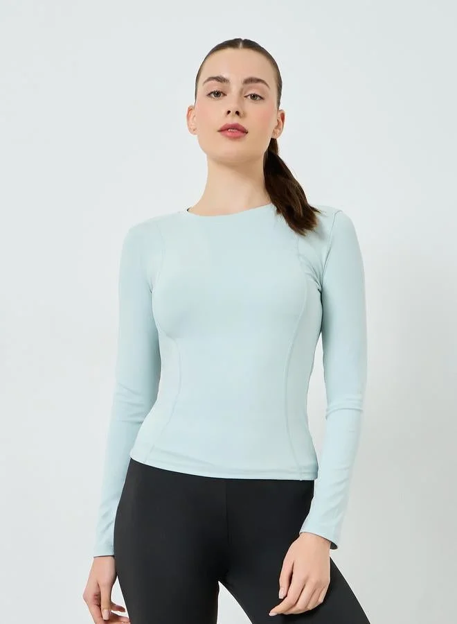 ستايلي اكتيف بلوزة مُجسمة بياقة دائرية وأكمام طويلة