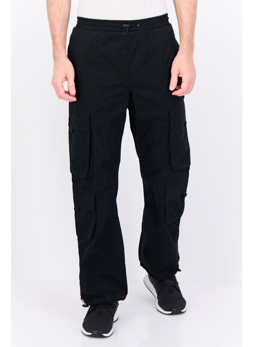 Men Regular Fit Plain Cargo Pants, Black - pzsku/ZD8516F7EA27CBDD62364Z/45/_/1737641668/53c16aee-4504-4ae5-b476-a070cf3196cc