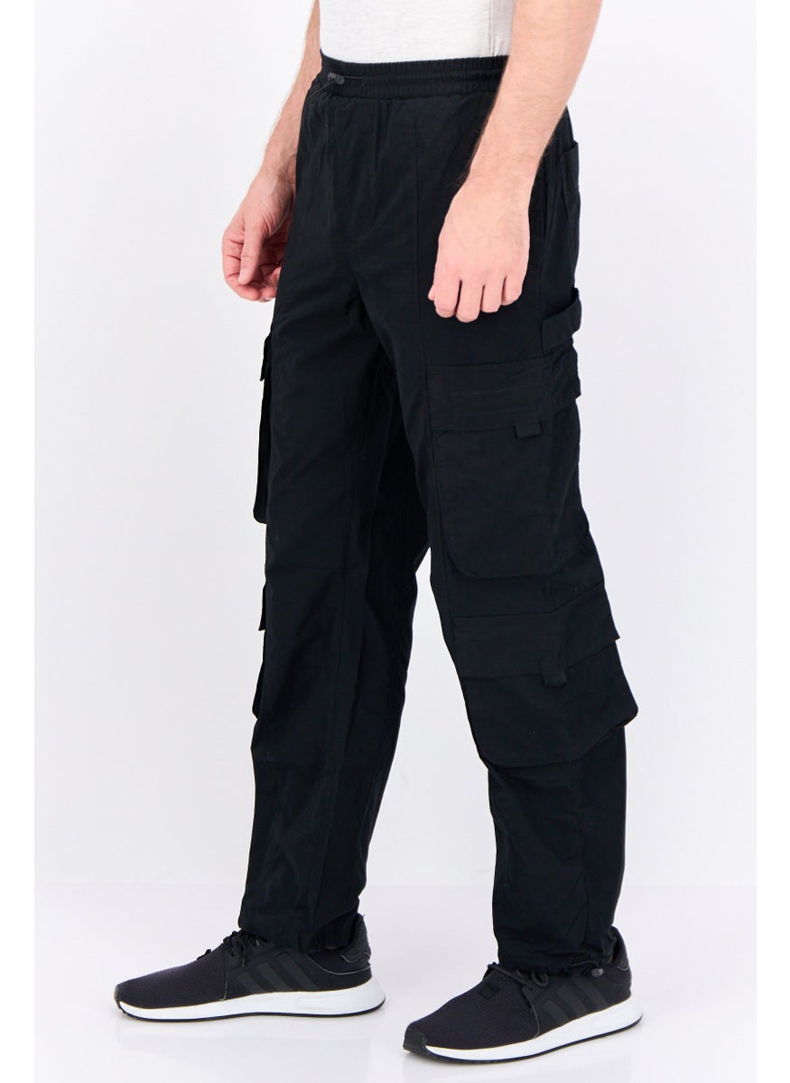 Men Regular Fit Plain Cargo Pants, Black - pzsku/ZD8516F7EA27CBDD62364Z/45/_/1737641670/718b23d1-c474-4510-9ed3-95ba8fc1167e