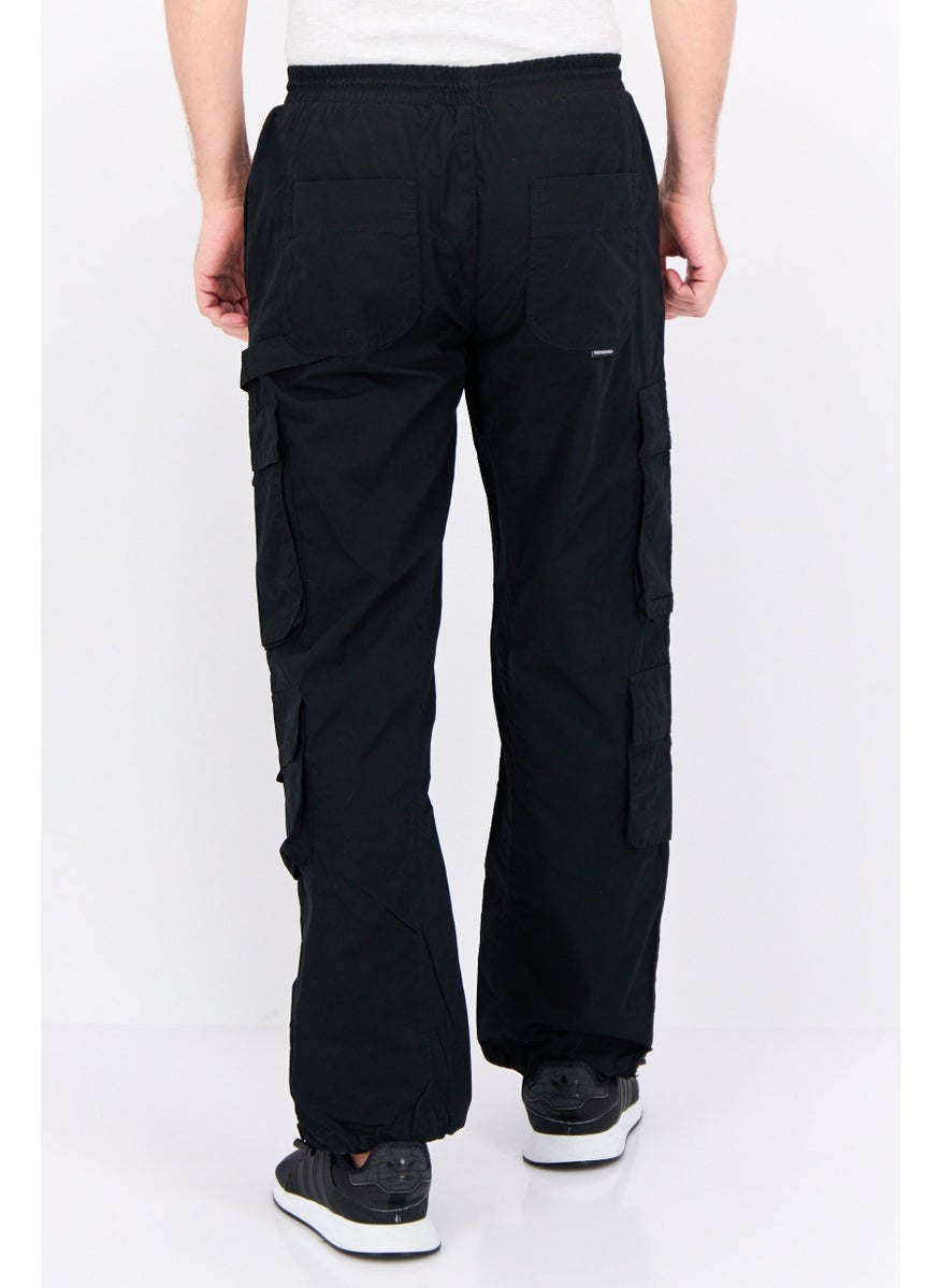 Men Regular Fit Plain Cargo Pants, Black - pzsku/ZD8516F7EA27CBDD62364Z/45/_/1737641672/c57fc38f-f813-46d8-b528-fc45fee61911