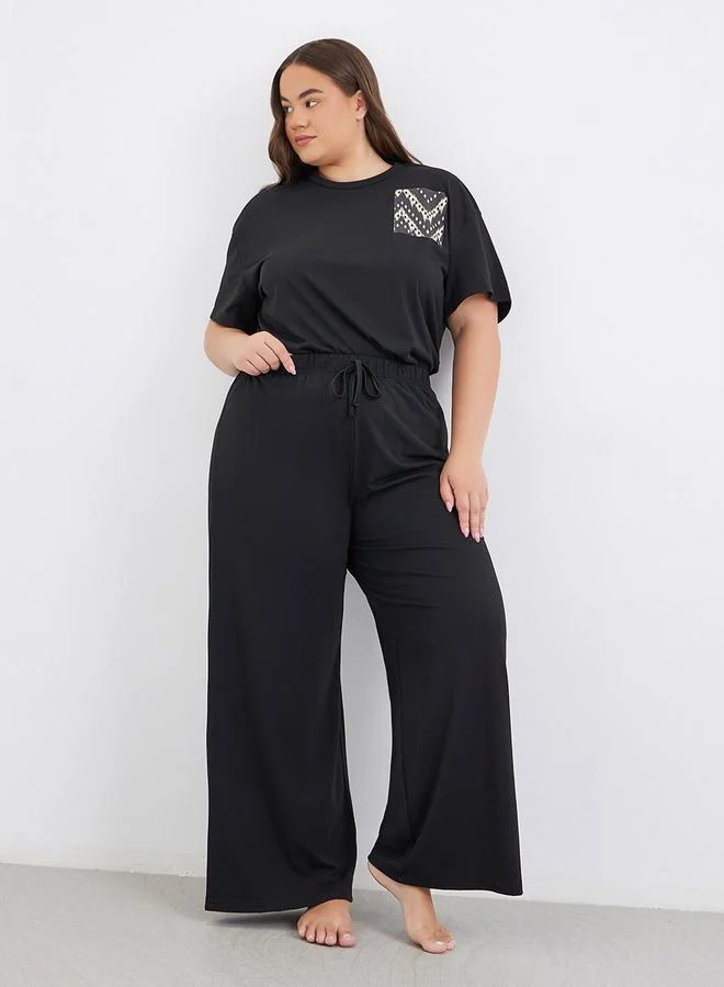 Styli Styli Plus Size Mono Aztec Pocket Dropped Shoulder T-Shirt and Pyjama Set