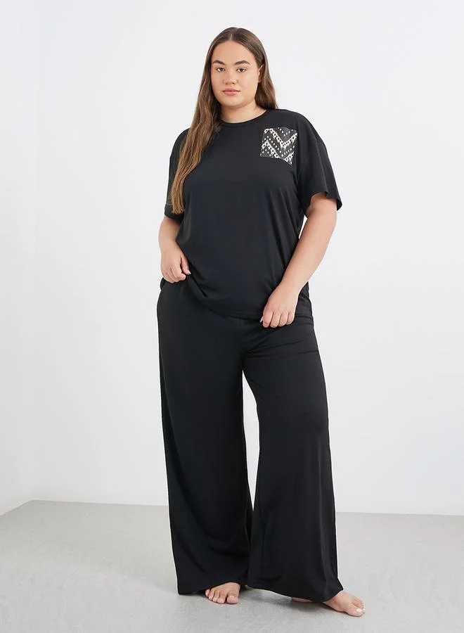 Styli Styli Plus Size Mono Aztec Pocket Dropped Shoulder T-Shirt and Pyjama Set