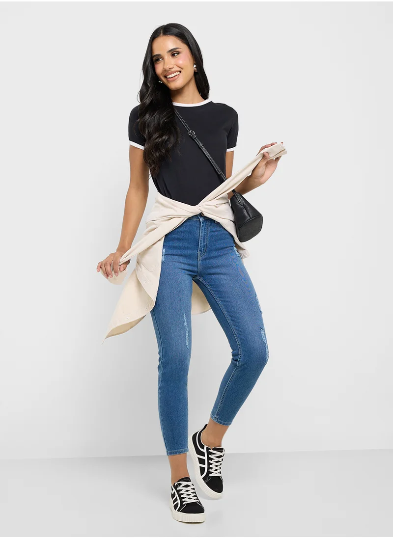 Ginger Distressed Mid Rise Skinny Jeans