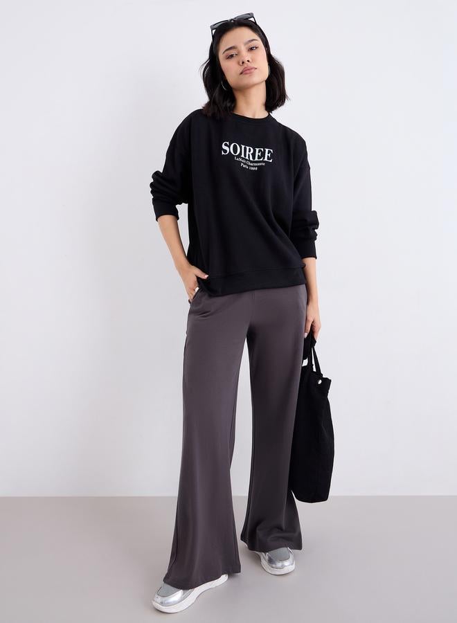 Styli Women Black Oversized Slogan Print Sweatshirt - Image 2