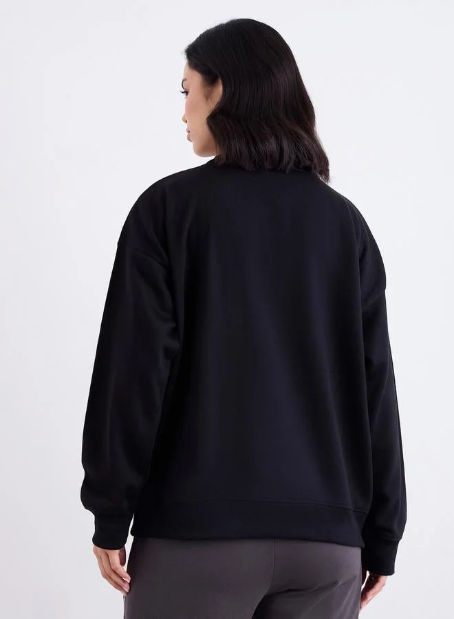 Styli Women Black Oversized Slogan Print Sweatshirt