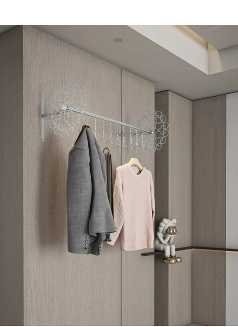 Wall clothes rack is mounted on the wall with four screws