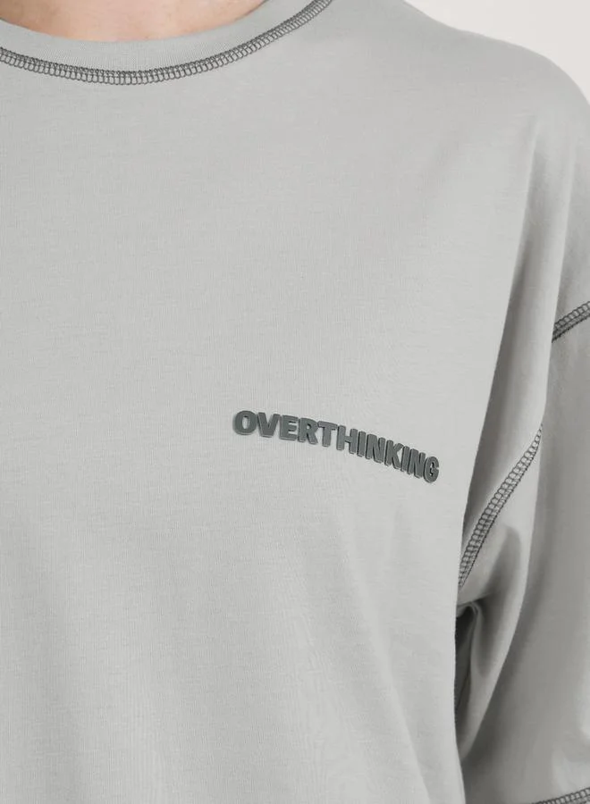 Styli Slogan Print Oversized Jersey T-Shirt with Stitch Detail