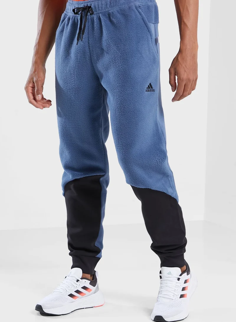 adidas بنطال رياضي بنمط كتل الألوان